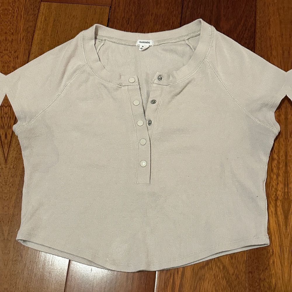 Garage cream baby tee